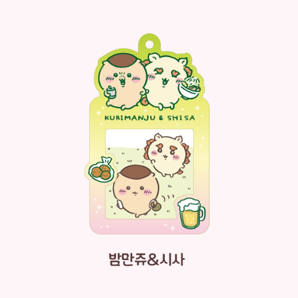 Colorful, officially licensed Chiikawa photo frame keychains featuring pastel gradients, character illustrations, and transparent window slots. Gold keyrings and lobster clasps are attached at the top of each charm holder.