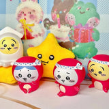 Four officially licensed Chiikawa vinyl figures, featuring characters Chiikawa, Usagi, and Hachiware in red octopus and white squid costumes with blue and white polka-dot headbands.