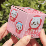 Four officially licensed Chiikawa vinyl figures, featuring characters Chiikawa, Usagi, and Hachiware in red octopus and white squid costumes with blue and white polka-dot headbands.