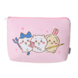 A soft pink plush pouch featuring an officially licensed illustration of Chiikawa characters Hachiware, Chiikawa, and Usagi holding staffs. The back shows the Chiikawa brand name in hot pink text surrounded by musical notes, all secured with a matching pink zipper.