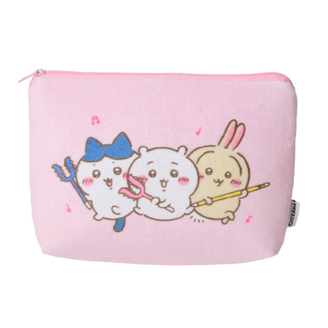 A soft pink plush pouch featuring an officially licensed illustration of Chiikawa characters Hachiware, Chiikawa, and Usagi holding staffs. The back shows the Chiikawa brand name in hot pink text surrounded by musical notes, all secured with a matching pink zipper.