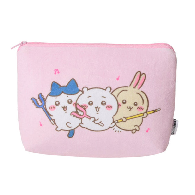 A soft pink plush pouch featuring an officially licensed illustration of Chiikawa characters Hachiware, Chiikawa, and Usagi holding staffs. The back shows the Chiikawa brand name in hot pink text surrounded by musical notes, all secured with a matching pink zipper.