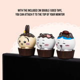 An official licensed collection of Chiikawa mystery Sweet Series blind boxes featuring brown and secret pink cupcake-themed packaging. Characters like Chiikawa, Hachiware, and Usagi are styled as cupcakes with frosting and sprinkles.