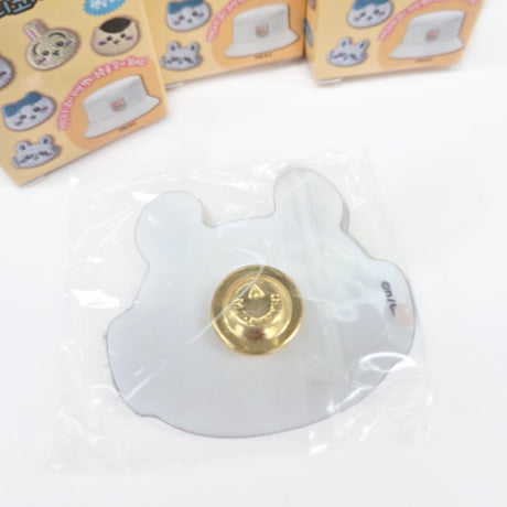 Officially licensed Chiikawa collection of eight fuzzy, plush-embroidered ticochi character face magnet blind box featuring Chiikawa, Hachiware, Usagi, and friends
