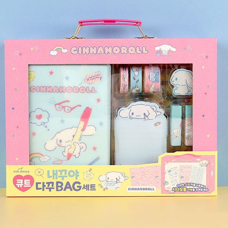 Cinnamoroll themed stationery set displayed in a box, including a diary, stickers, seals, wrapping paper, masking tape, a memo pad, a clip, and stamps.