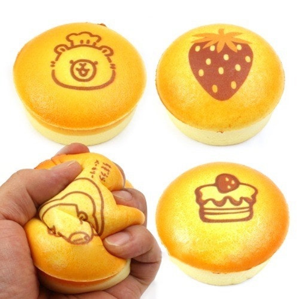 Custard Bun Squishy toys styled like golden baked custard bread with printed bear and dessert illustrations
