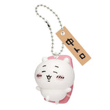 Front view of the officially licensed Chiikawa tuna sushi keychain from the blind box series. White Chiikawa figure wearing a pink tuna (Chutoro) slice on its back, attached with a silver ball chain and Japanese wooden name tag