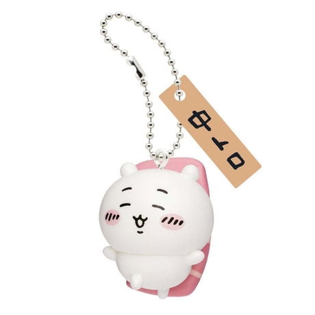 Front view of the officially licensed Chiikawa tuna sushi keychain from the blind box series. White Chiikawa figure wearing a pink tuna (Chutoro) slice on its back, attached with a silver ball chain and Japanese wooden name tag