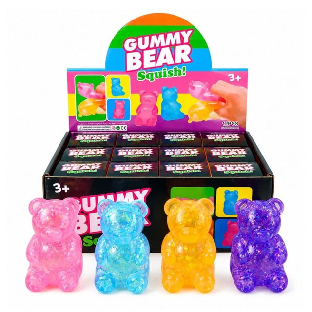 Translucent gummy bear-shaped squishy stress toys filled with sparkling glitter in pink, blue, yellow, and purple