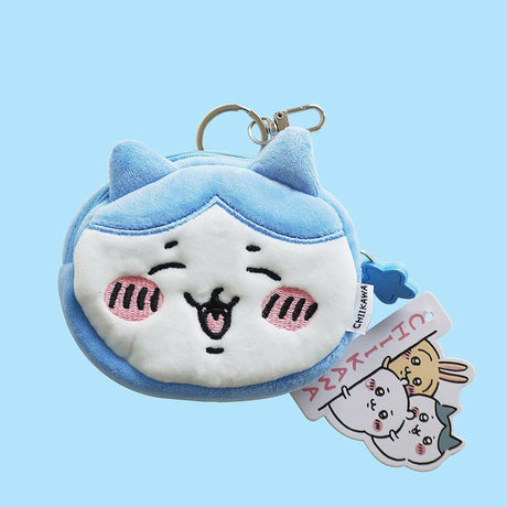 Hachiware blue and white face pouch clip-on keychain. A small plush coin purse with a secure metal clip, designed as a Japanese kawaii character accessory for kids and collectors