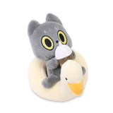 An officially licensed 6-inch Hakongee cat plush by WSL sitting in a cream duck floatie while holding a coffee cup