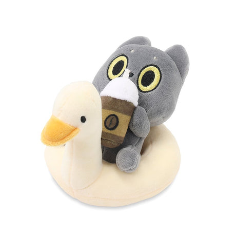 An officially licensed 6-inch Hakongee cat plush by WSL sitting in a cream duck floatie while holding a coffee cup