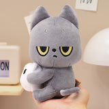 Black Cat plush cat toy held in a hand with a neutral background