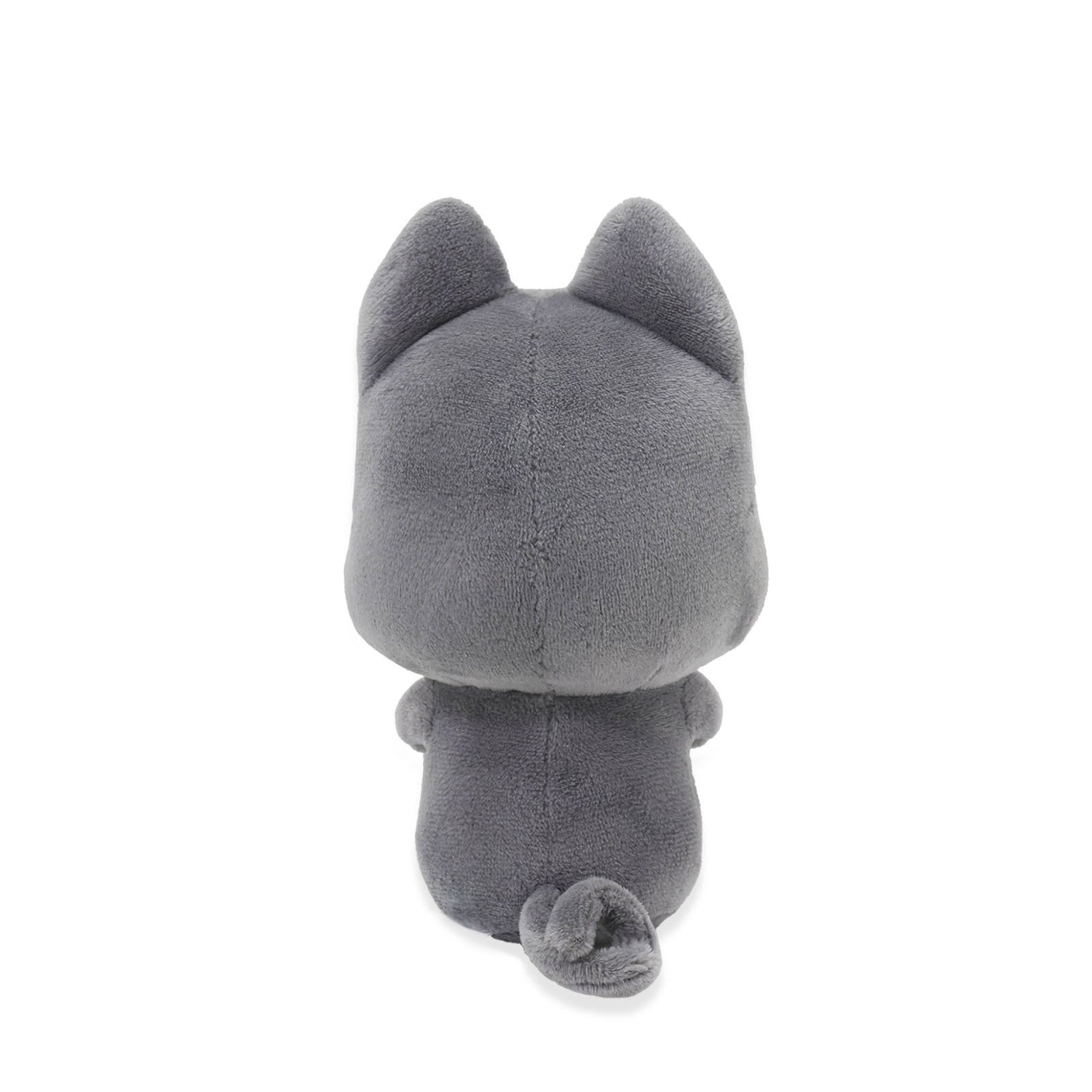Black plush toy with cat-like features on a white background