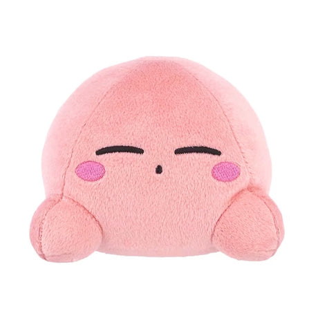 An officially licensed soft, round pink Kirby plush cushion resting peacefully with embroidered closed eyes and rosy cheeks