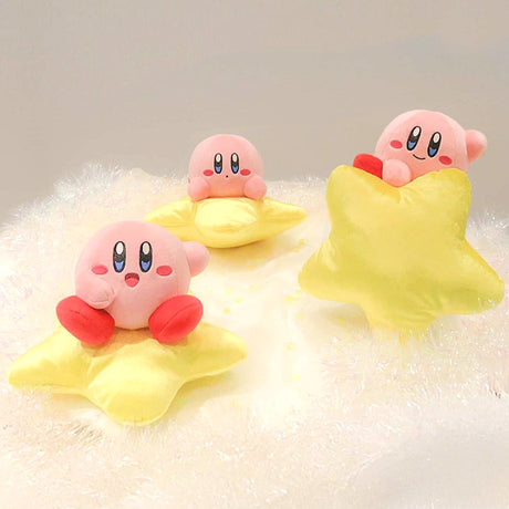 An officially licensed collection of Kirby's Dream Land plush toy featuring a pink Kirby sitting on top of a fluffy yellow star plush