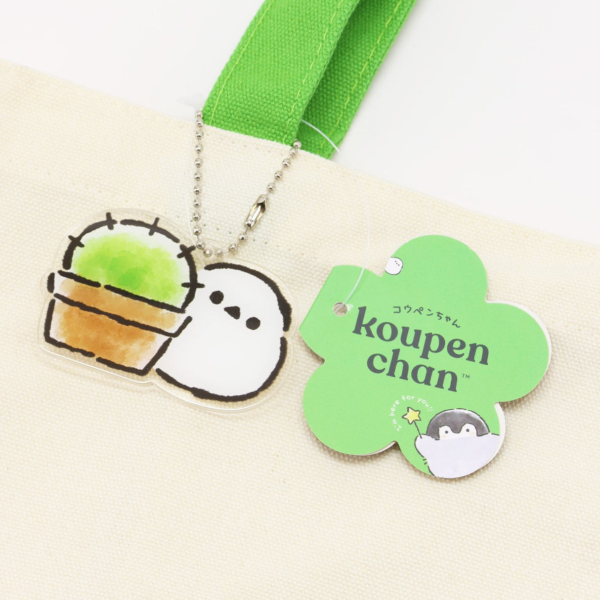 Official Koupen Chan Accessory: Official licensed cotton tote bag and acrylic charm set. Durable natural cotton canvas for collectors of the original illustration style.