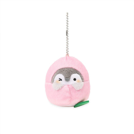 Official Spiralcute Koupen Chan Pink Peach Costume Plush Mascot Keychain featuring a soft grey winking penguin in a pastel pink peach hood with a green leaf accent, attached to a sturdy silver ball chain for bags and backpacks to serve as a comforting workplace healing companion and emotional support tool for adult kidult collectors.