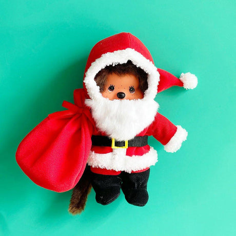 Officially licensed by Sekiguchi Japan, Limited Edition Mochhichi boy dressed in Santa Clause outfit, put on a Santa beard and holding Santa's sack. Monchhichi boy santa crafted from soft plush materials with a vinyl face and freckles make Monchhichi so cute. He’s perfect for cuddling, displaying, or gifting to Monchhichi fans of all ages. ideas holiday gift or collectible figures with guaranteed authenticity.