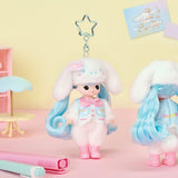 Cinnamoroll Little Mimi doll with blue hair and a star-shaped keychain on a pastel background