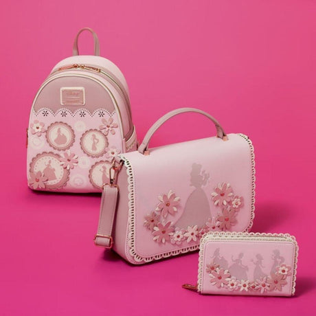 Light pink crossbody bag by the collaboration of Loungefly and Disney featuring silhouettes of Disney Princess, decorated with 3D faux leather flowers with gold studs and a scalloped lace-style border.