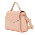Officially licensed Disney Mickey Mouse & Friends light pink-colored tote crossbody bag featuring a 3D character emblem, scalloped trim, and embossed character patterns