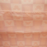 Officially licensed Disney Mickey Mouse & Friends light pink-colored tote crossbody bag featuring a 3D character emblem, scalloped trim, and embossed character patterns