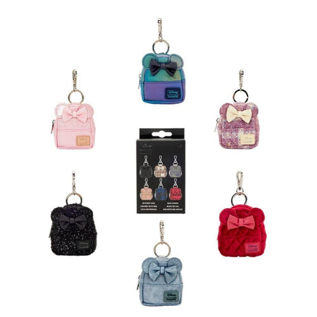 Loungefly and Disney Minnie Mouse's collboration of mini backpack keychain charm featuring 3D bow, applique, glitter, iridescent, quilted, shimmer faux leather, velvet, and printed details