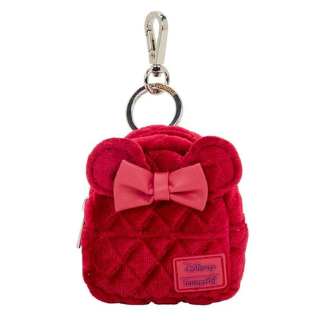 Loungefly and Disney Minnie Mouse's collboration of mini backpack keychain charm featuring 3D bow, applique, glitter, iridescent, quilted, shimmer faux leather, velvet, and printed details