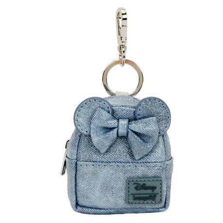 Loungefly and Disney Minnie Mouse's collboration of mini backpack keychain charm featuring 3D bow, applique, glitter, iridescent, quilted, shimmer faux leather, velvet, and printed details