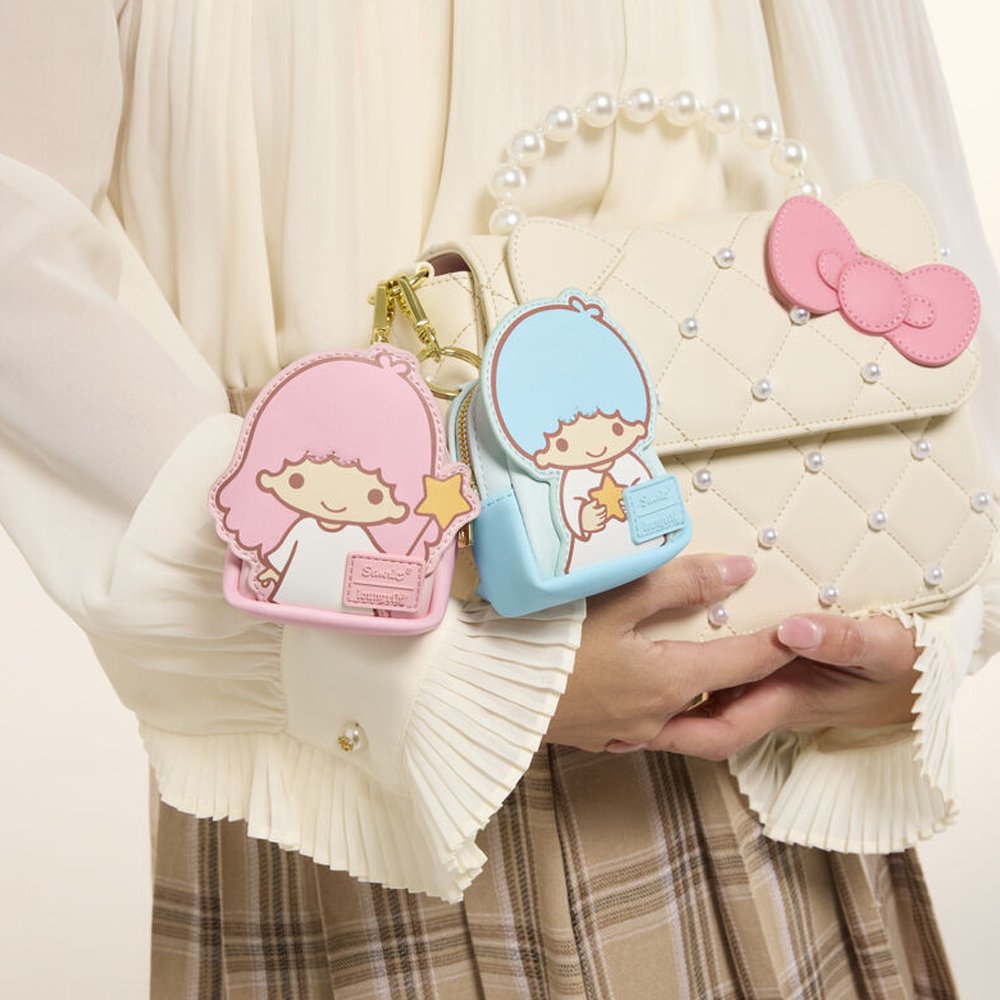 A collection of six Sanrio Backpack Charm Blind Box Keychains, featuring Hello Kitty, Pochacco, Chococat, Kiki, Lala, and Badtz-Maru