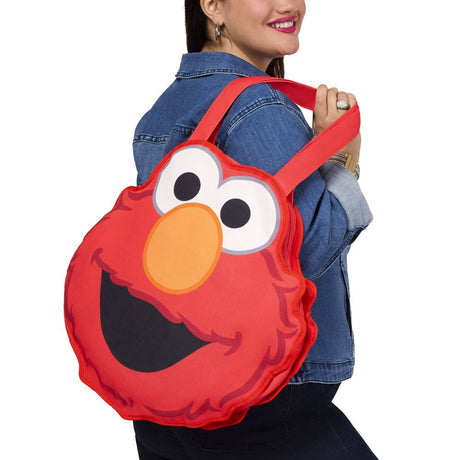 Officially licensed Sesame Street Elmo face shaped large red tote bag made of soft canvas fabric with large embroidered eyes and a wide smiling mouth