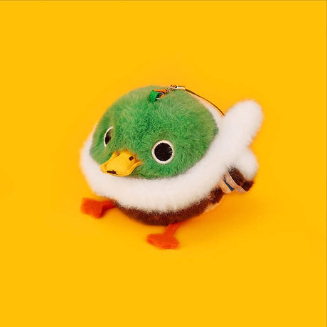 A round, fluffy Mallard duck bird plush keychain with a green head, white ring, and brown body, featuring orange legs and a yellow beak