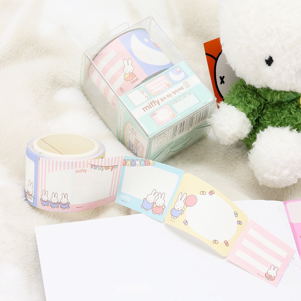 An officially licensed Class of 2026 Miffy graduation gift set featuring yellow, orange, green, and blue color Miffy plush and Boris plush wearing black graduation caps. The characters are arranged like a bouquet with silver star balloons and "Congrats Grad" decorations.