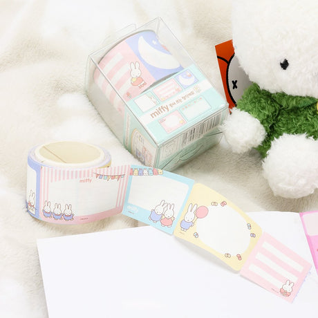 An officially licensed Class of 2026 Miffy graduation gift set featuring yellow, orange, green, and blue color Miffy plush and Boris plush wearing black graduation caps. The characters are arranged like a bouquet with silver star balloons and "Congrats Grad" decorations.
