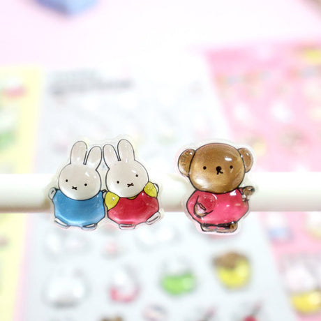 Four colorful sheets of officially licensed Miffy crystal stickers in yellow, white, pink, and blue. The 3D-raised glossy stickers feature Miffy, her friends, animals, and cute icons.