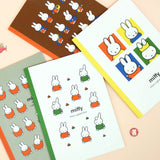 An officially licensed collection of colorful Miffy lined notebooks featuring illustrated covers and a close-up of lined inner pages with a small Miffy illustration printed at the bottom corner.