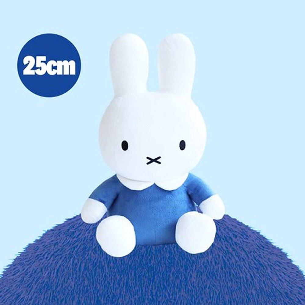 Official Miffy sitting plush wearing a classic blue dress. This pure white minimalist doll is designed for adult collectors seeking childhood nostalgia and visual rest. Its stable sitting posture makes it a perfect soothing desktop companion or a nostalgic shelf decor piece for a high-stress modern lifestyle