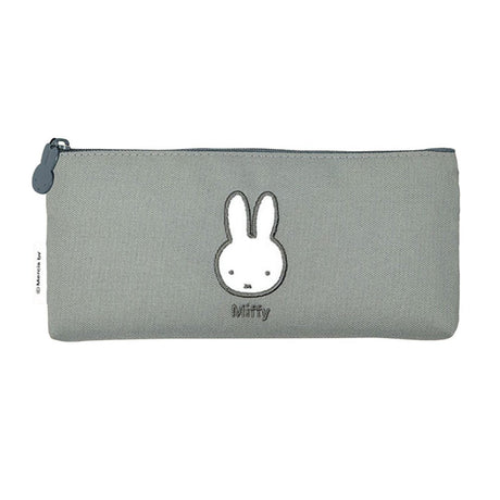 Two slim canvas pencil cases: one grey featuring an embroidered Miffy face and one tan featuring Boris Bear. Both cases have character-shaped zipper pulls.