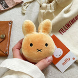 An officially licensed Miffy golden-brown bread plush charm keychain with embroidered eyes