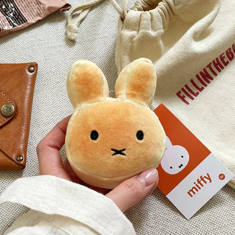 An officially licensed Miffy golden-brown bread plush charm keychain with embroidered eyes
