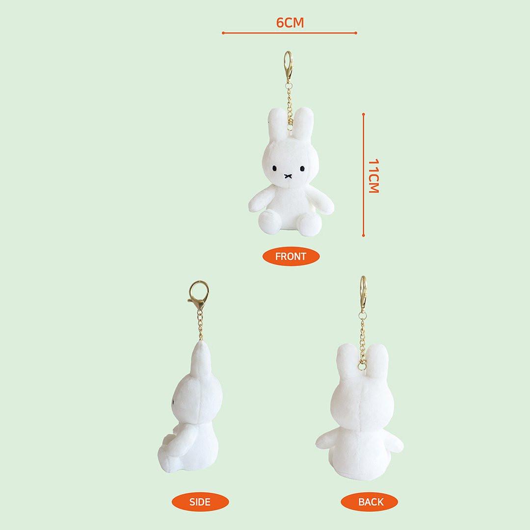Detailed measurement guide for the Official Miffy Glow in the Dark Mascot Plush Keychain; showing 11cm height and 6cm width dimensions from front, side, and back views. This 11cm white rabbit bag charm is a perfectly sized premium gift for adult collectors, birthdays, and minimalist office-core desk decor.
