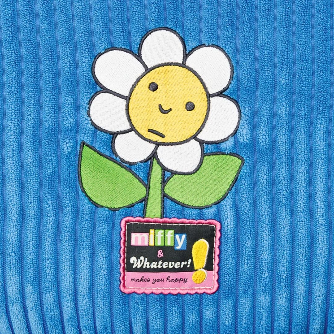 Officially licensed Miffy large Tote bag,  shown against a white background. The bag is blue, corduroy Miffy bunny-shaped shoulder bag, featuring daisy face embroidered in back .