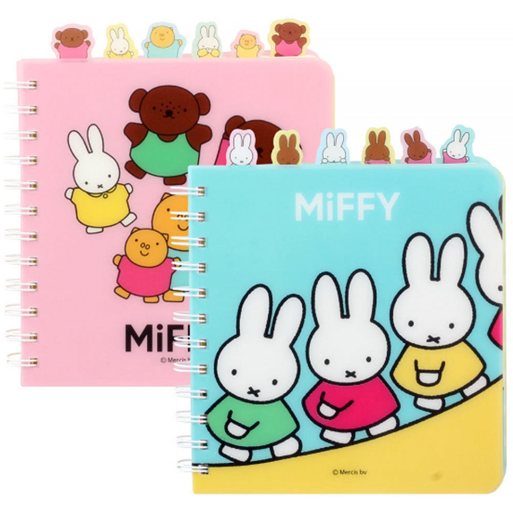 Officially licensed Miffy spiral notebooks in pink and blue, featuring die-cut character tabs of Miffy and friends along the top edge and white spiral binding.