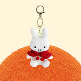 Officially licensed by Miffy white knit Plush keychain in a red cape. She's perfect for ornament , displaying, bag decoration or gifting Christmas to Miffy fans of all ages.