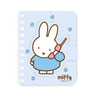 A series of officially licensed Miffy spiral notebooks in pastel pink, blue, and purple, featuring a large magnetic character buckle. The interior shows lined paper with a small Miffy graphic in the bottom corner, highlighting the notebook's functional and cute design.