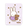 A series of officially licensed Miffy spiral notebooks in pastel pink, blue, and purple, featuring a large magnetic character buckle. The interior shows lined paper with a small Miffy graphic in the bottom corner, highlighting the notebook's functional and cute design.