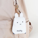 An officially licensed Miffy plush mini backpack pouch keychain in brown, ivory, pink, and black, featuring a gold bunny shaped clip.