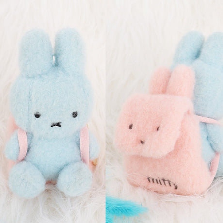 An officially licensed Miffy plush mini backpack pouch keychain in brown, ivory, pink, and black, featuring a gold bunny shaped clip.