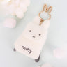 An officially licensed Miffy plush mini backpack pouch keychain in brown, ivory, pink, and black, featuring a gold bunny shaped clip.